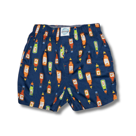 Weunderlust Navy blue boxer shorts  with hot sauce bottle pattern on a white background