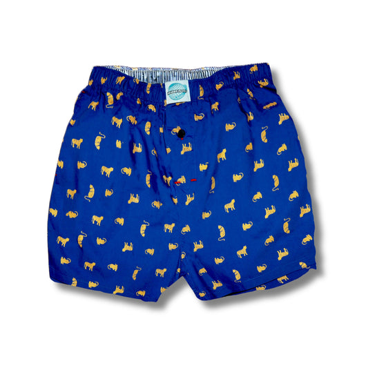 Blue boxer briefs with yellow cat pattern on a white background