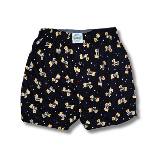 Navy boxer shorts with dog pattern on a white background