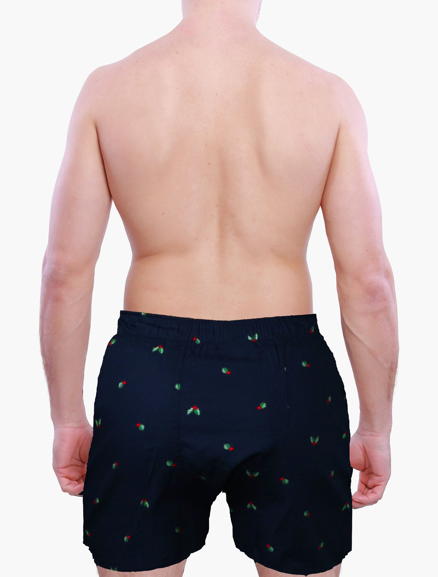 Person wearing Weunderlust navy boxer shorts briefs with hollies graphics on a white background