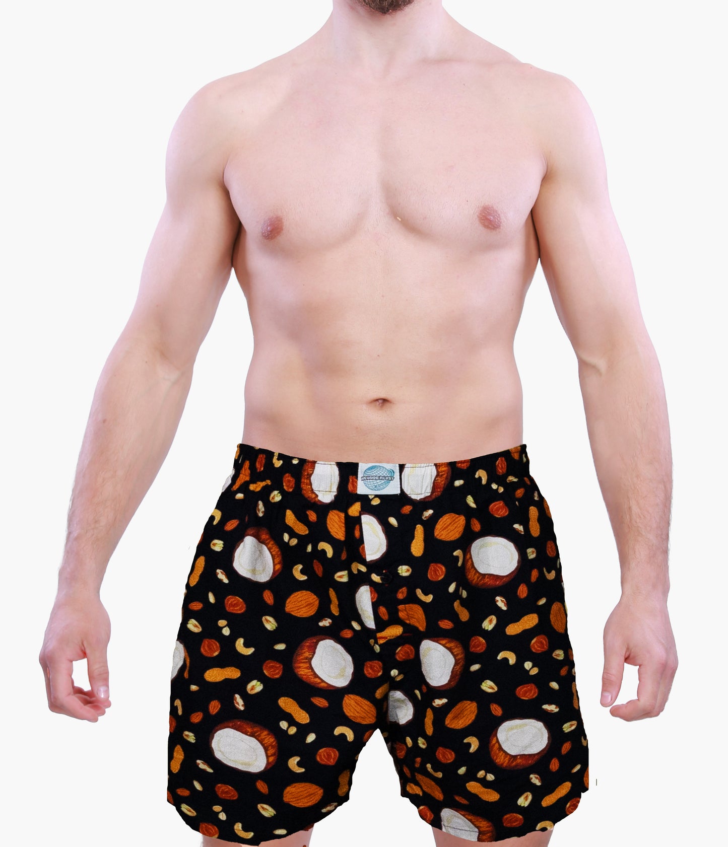 Man wearing Weunderlust boxer Shorts with a pattern of coconut and nuts on a white background