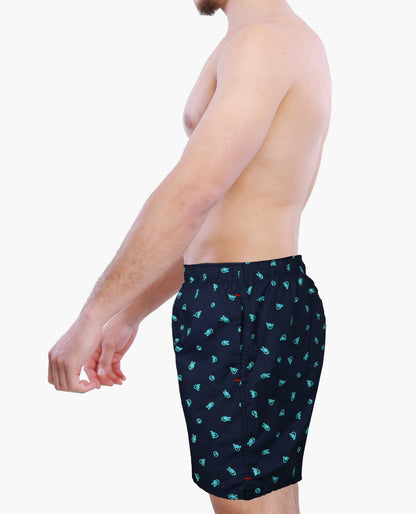 Side view of a Person wearing Weunderlust Navy boxer shorts with Icons pattern on a white background