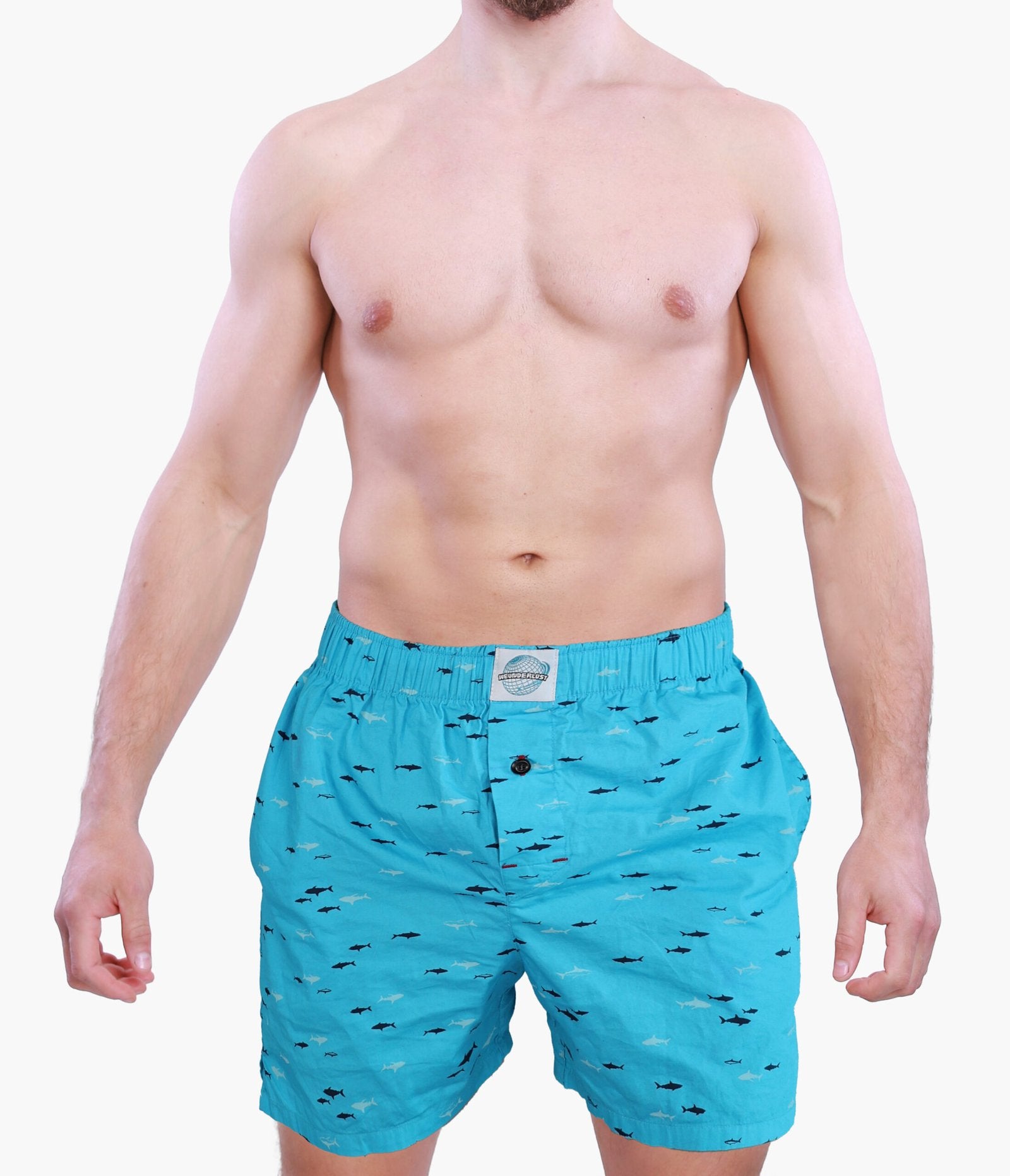 Male Model in Weunderlust Woven Cotton Boxers with pocket in the front, Baby Sharks, light blue