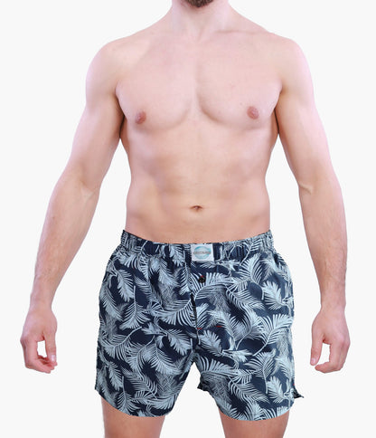 Front side of Male Model in Weunderlust Woven Cotton Boxers with pockets , Tropical, leaf printing, Blue, Navy