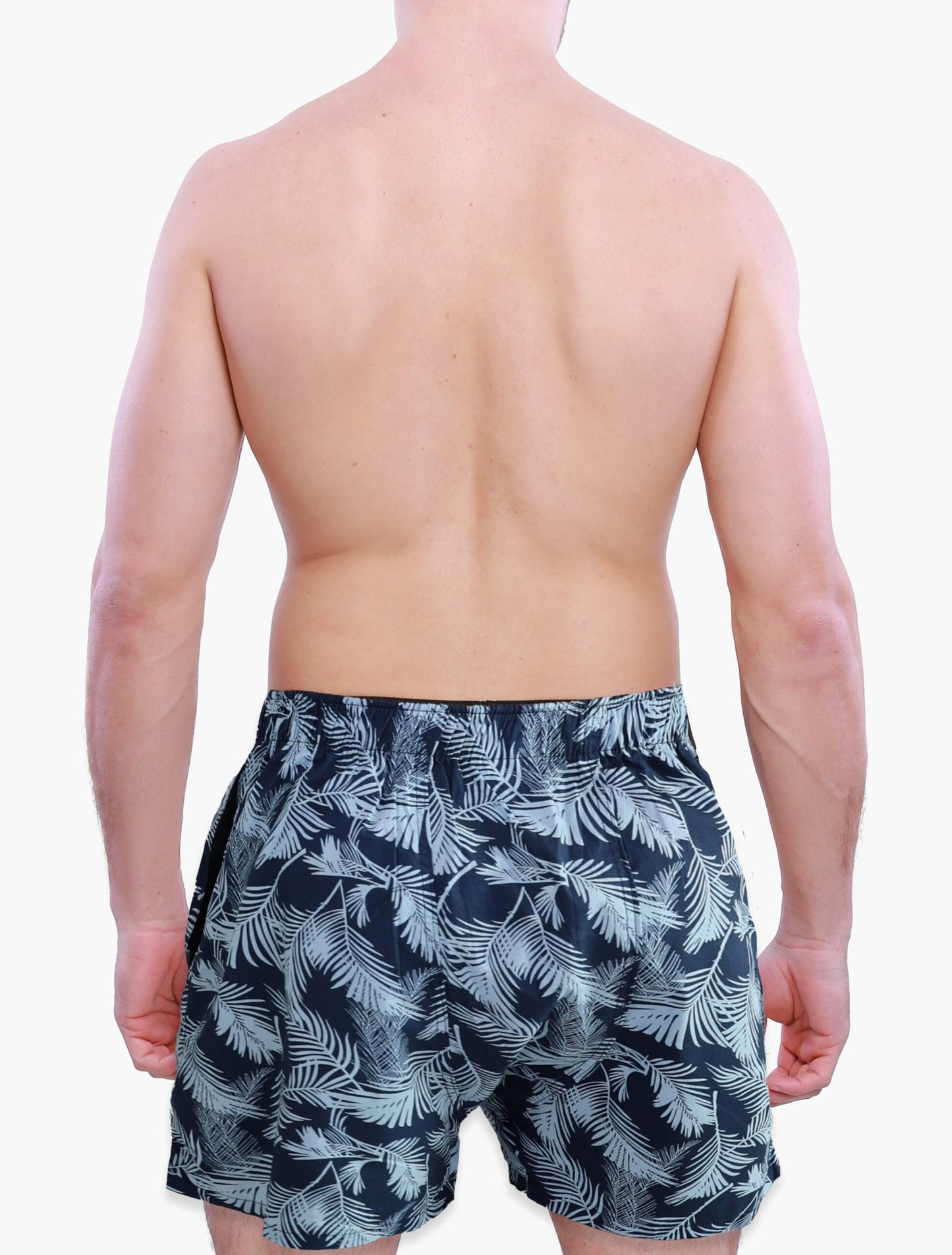 Back side of Male Model in Weunderlust Woven Cotton Boxers with pockets , Tropical, leaf printing, Blue, Navy